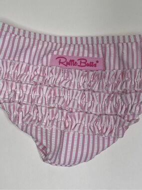 RuffleButts Baby Girls 6–12M Pink White Seersucker Stripe Ruffle Swim Bottom